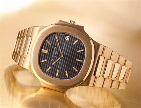 PATEK PHILIPPE, GOLD “JUMBO” NAUTILUS .